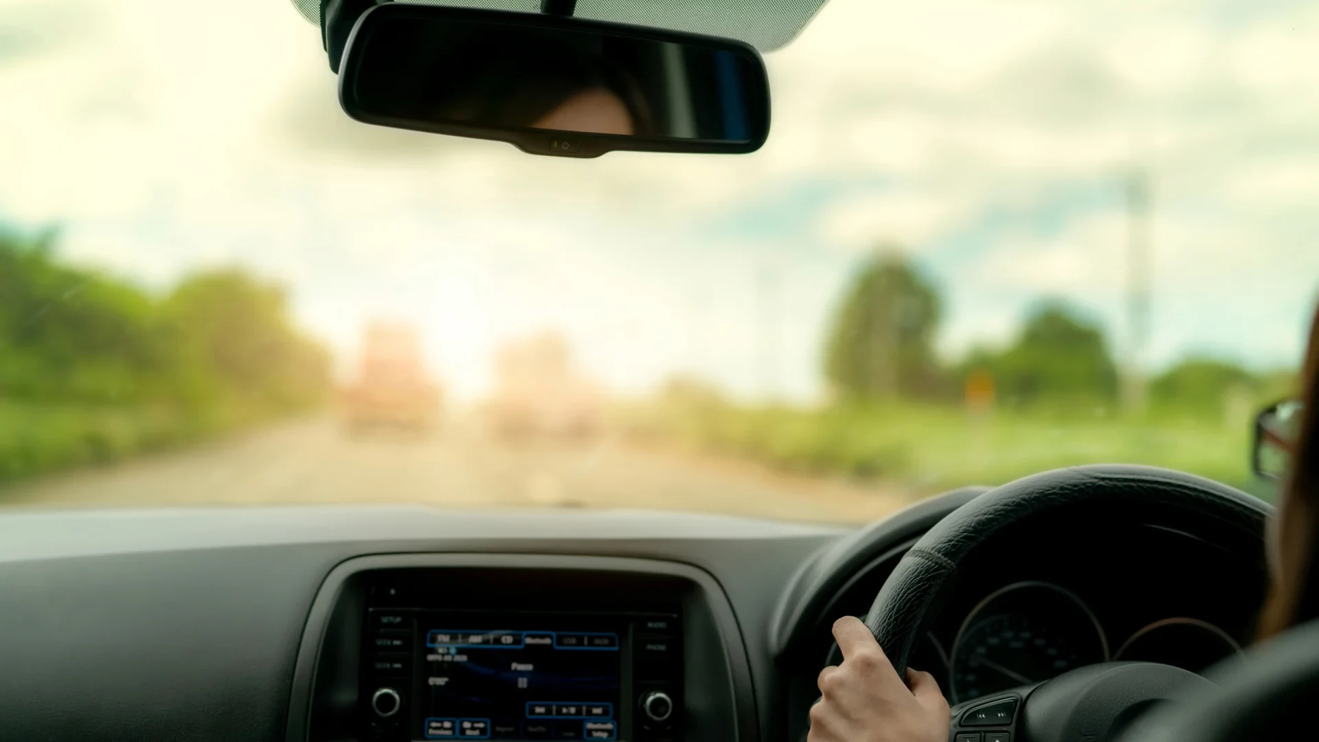 This young uninsured driver is just about to be tested and will collide with two trucks ahead. She has no insurance to cover her.